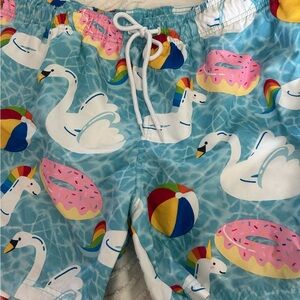 George Men's Blue Swim Trunks with White Swans, Pink Donuts & Multicolor Floats